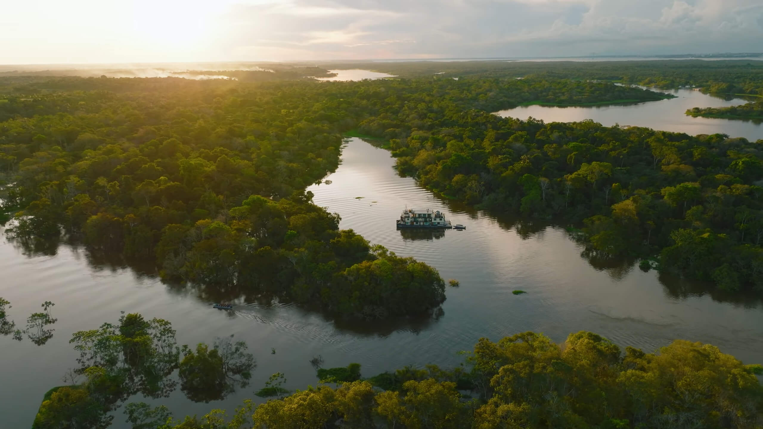 A drone shot of the Amazon River during a boat journey