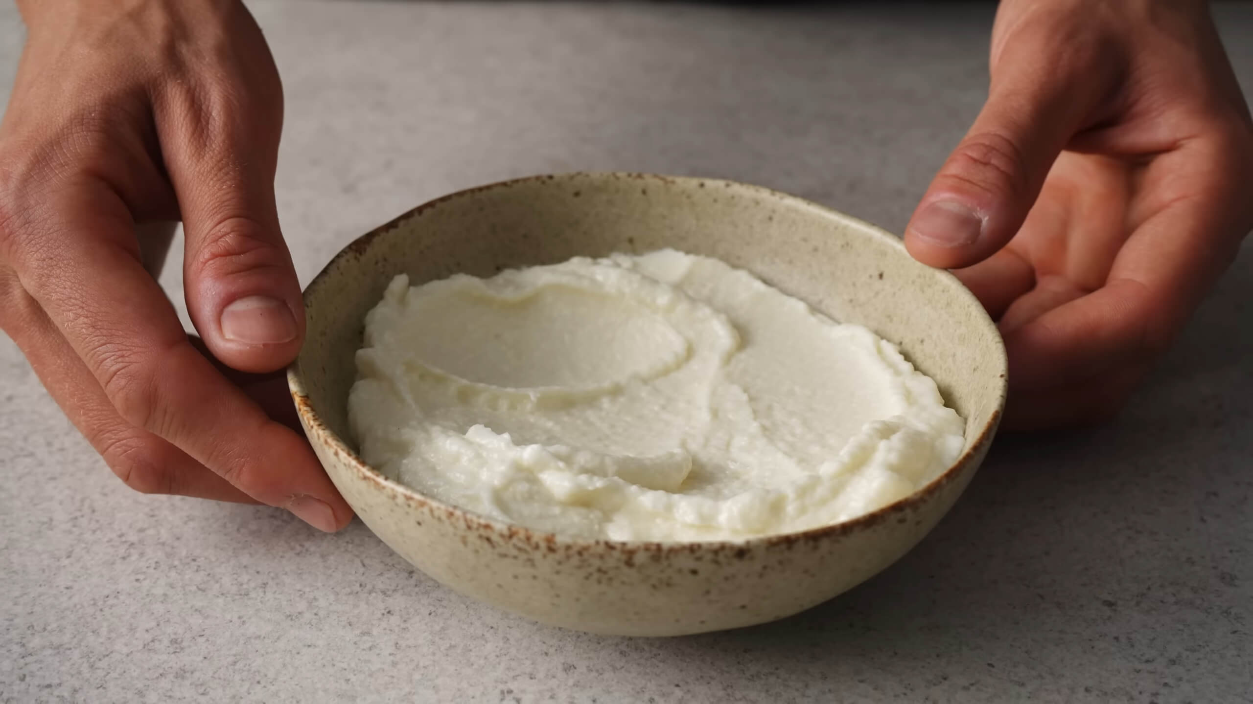 A container of garlic paste that can be used for a tooth abscess