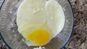 Add the Egg to Melted Cheese