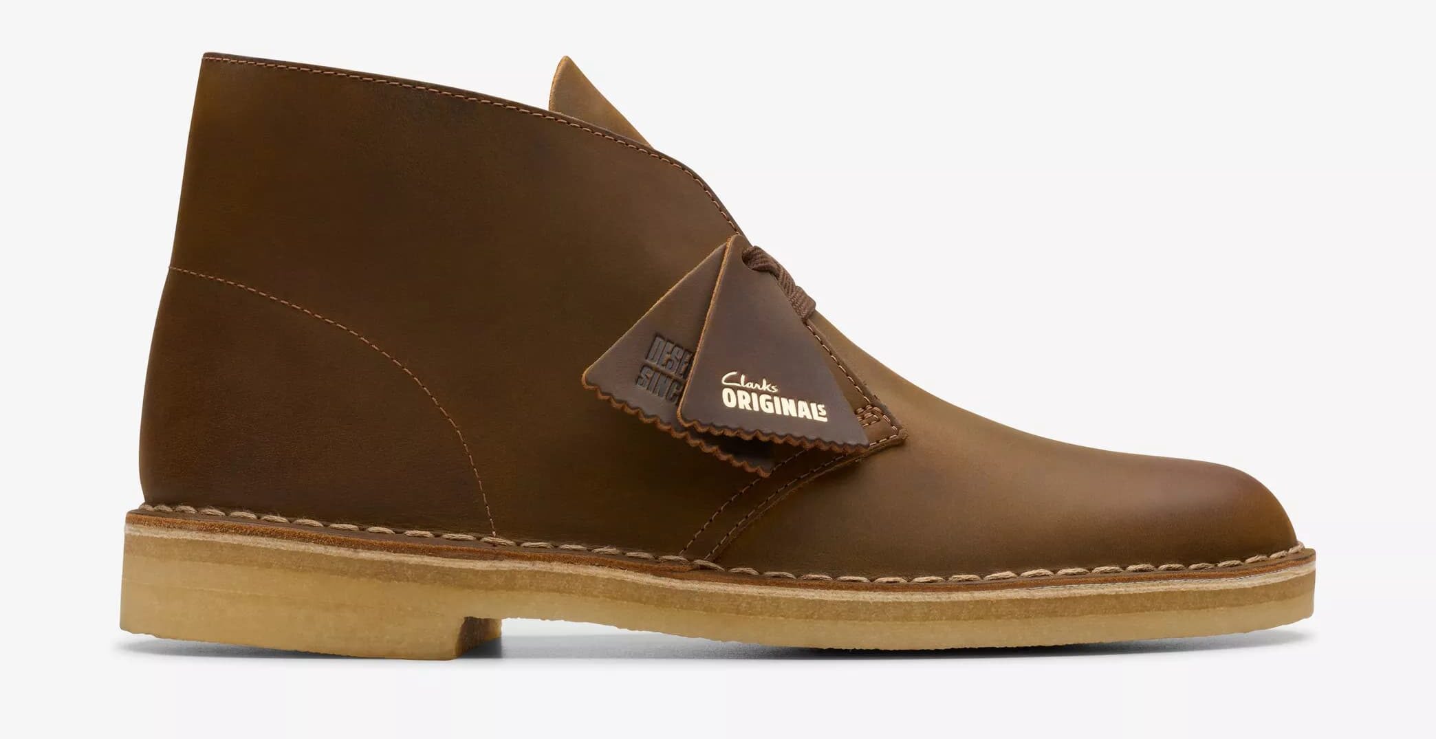 Brown leather Clarks desert boot with crepe sole and minimalist design