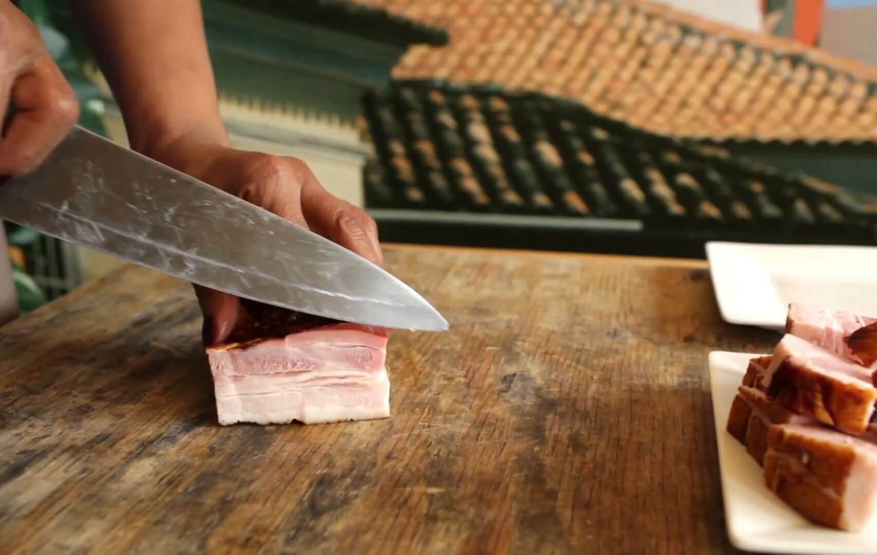 Cutting bacon into small cubes