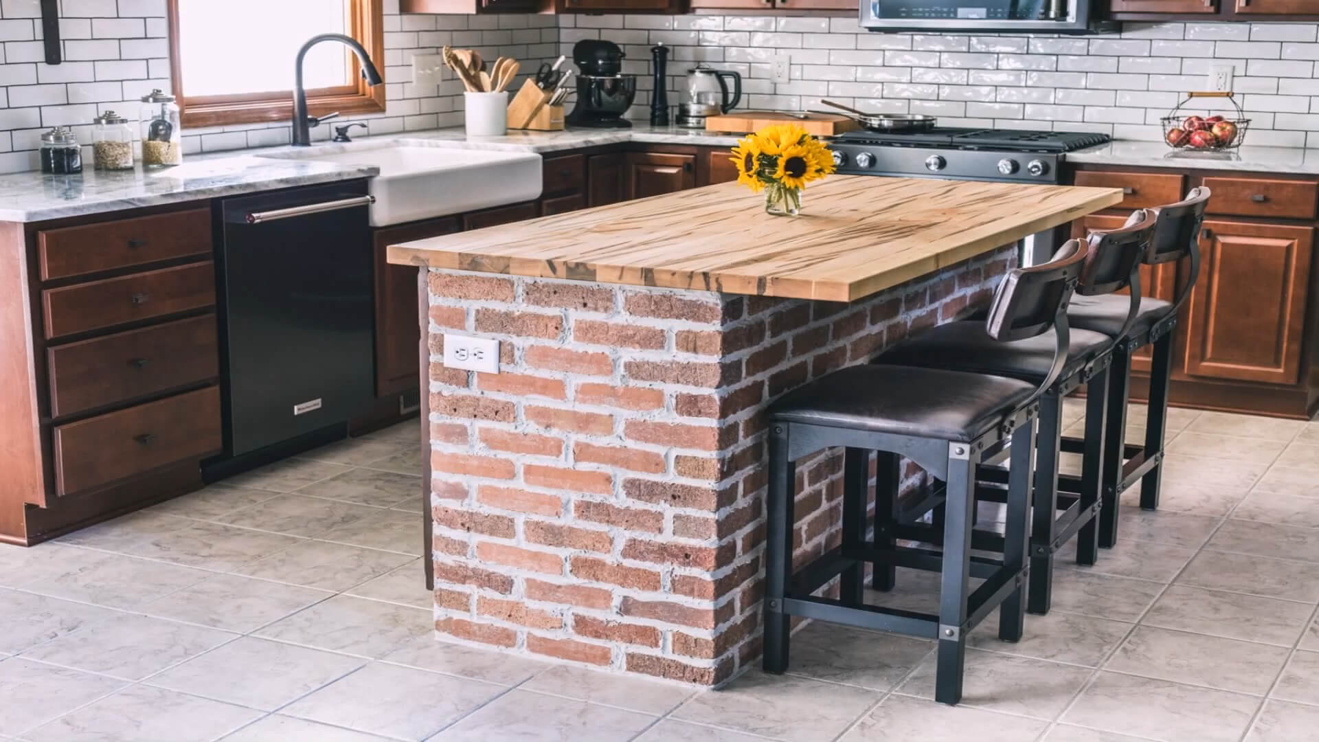 A kitchen island made of red bricks