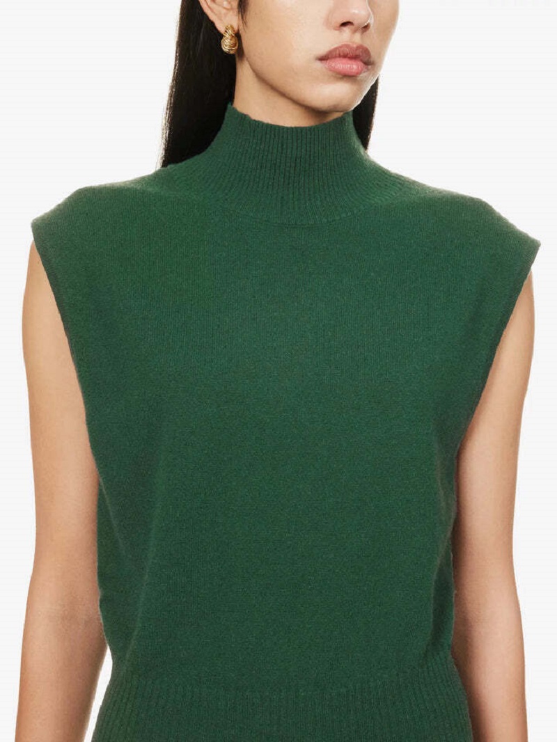 Sleeveless Reformation cashmere mock-neck top in dark green with a relaxed fit