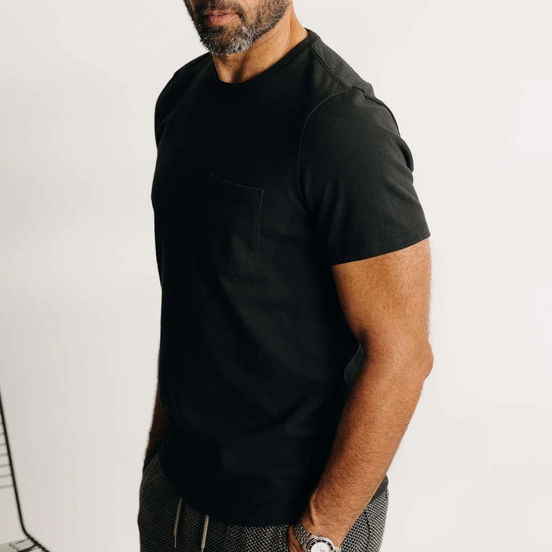 Taylor Stitch black Heavy Bag Crewneck t-shirt on a male model