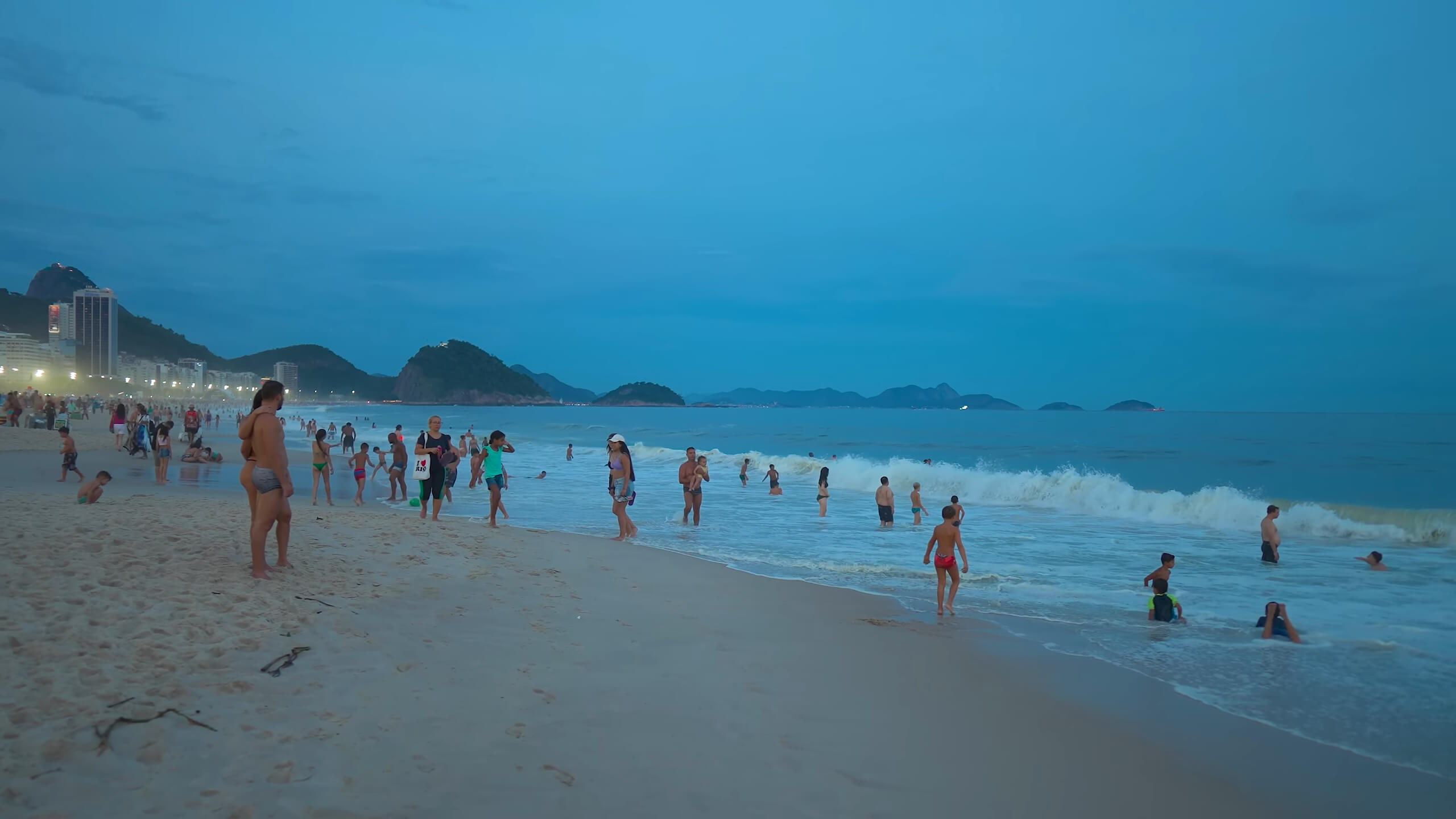 Copacabana beach full of people in the evening