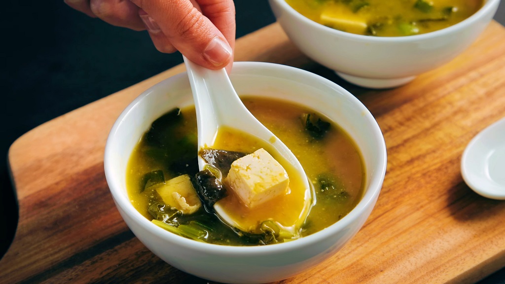 A bowl of miso soup, perfect to pair with sushi bake