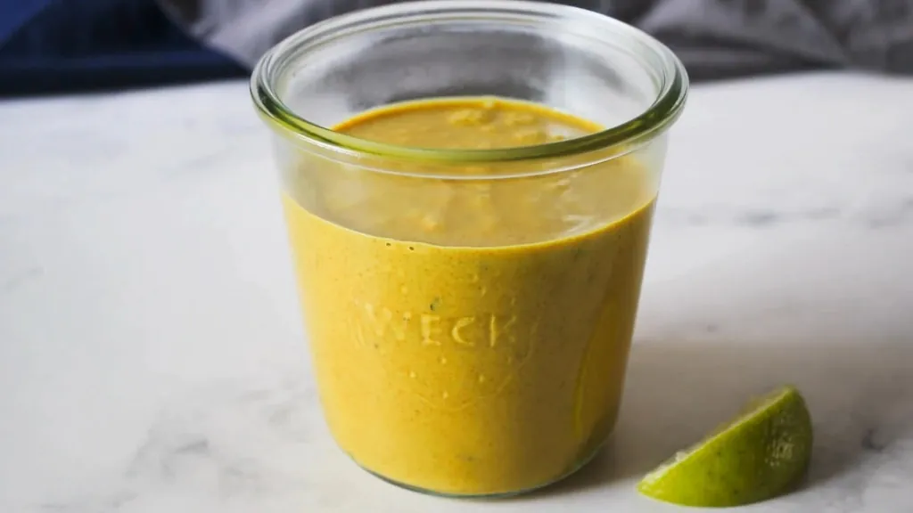 Prepared curry sauce in a jar, ready for storage