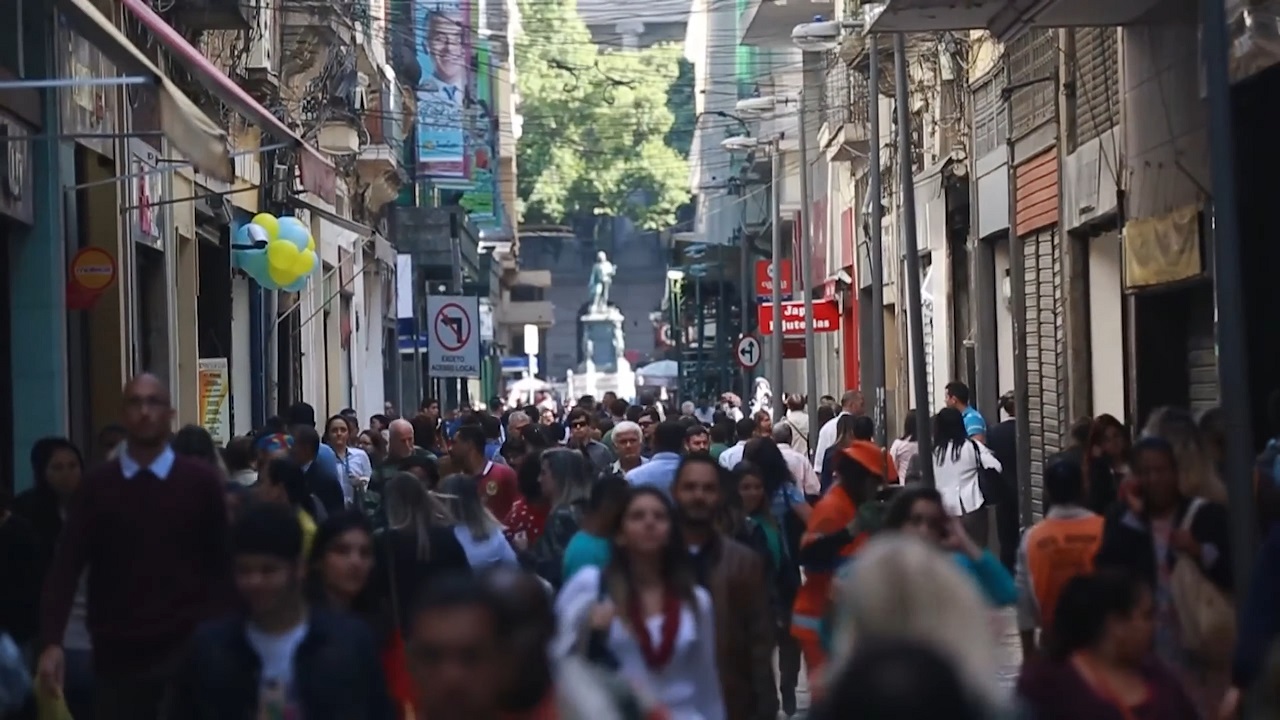 People walk the streets of Rio in Brazil