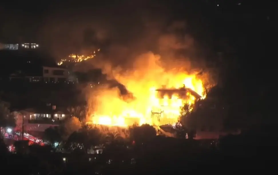 A four-story residence erupted in flames in Studio City