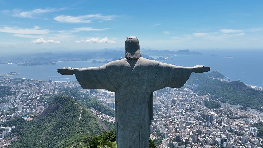 Aerial view of the iconic Christ the Redeemer statue overlooking the city of Rio de Janeiro