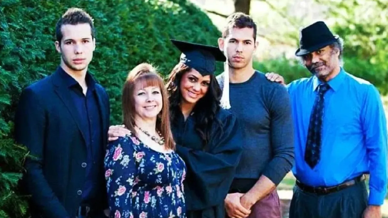 Janine Tate with her parents and brothers