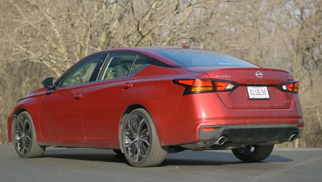 The rear of a red Nissan Altima