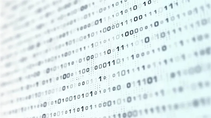 Binary code background showing digital data patterns