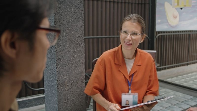 Visa officer interviewing an applicant during a visa process to the US from Brazil